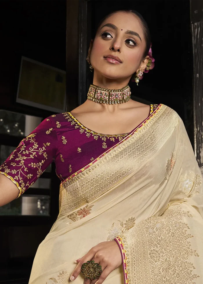 Cream Banarasi Silk Saree with Wine Embroidered Blouse