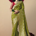 Mehendi Green Dola Silk Banarasi Saree with Red Blouse