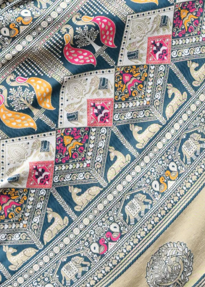White and Teal Blue Patola Silk Saree with Floral Motifs