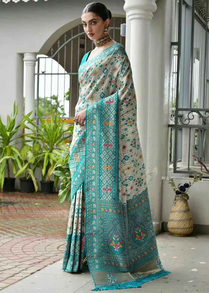 White and Turquoise Patola Silk Saree