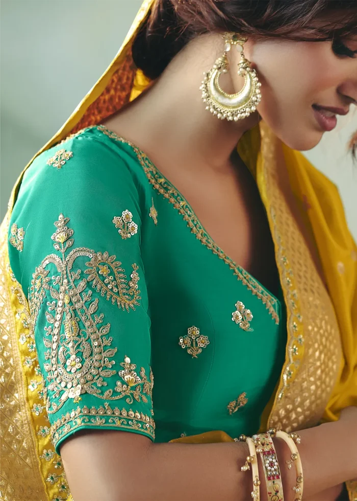 Yellow Banarasi Dola Silk Saree with Teal Blouse