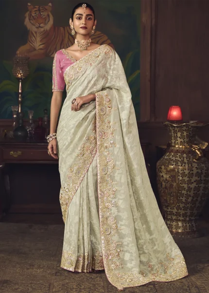 Embroidered Off White Kanjivaram Silk Saree with Pink Blouse