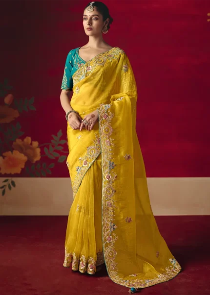 Embroidered Yellow Tissue Silk Saree with Teal Blouse