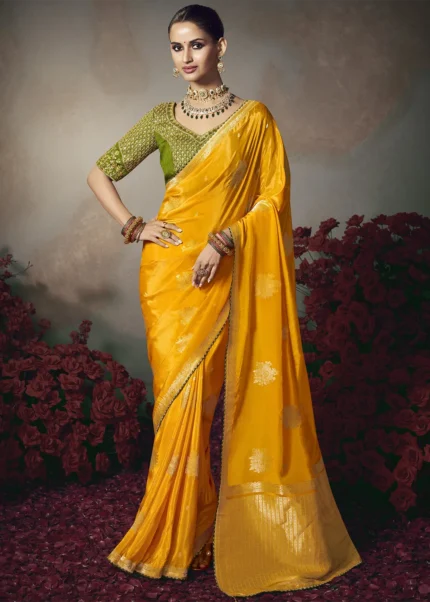 Saffron Yellow Banarasi Saree with Green Embroidered Blouse