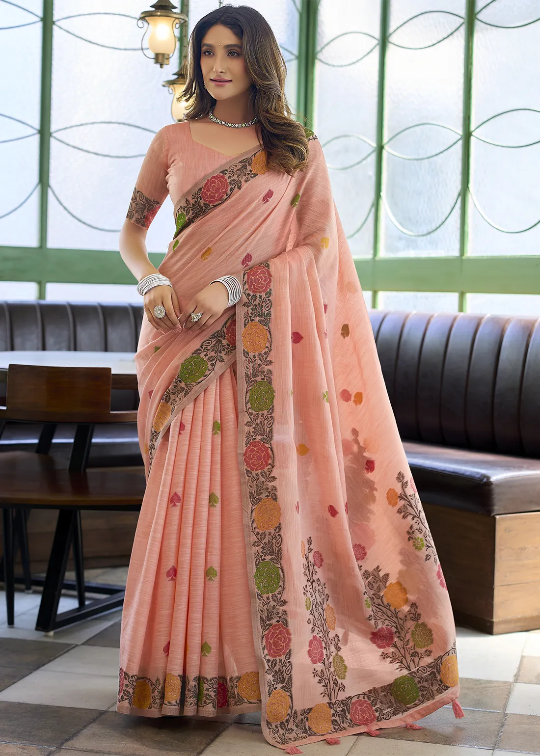 Peach Woven Linen Saree with Floral Motifs Peach Woven Linen Saree with Floral Motifs