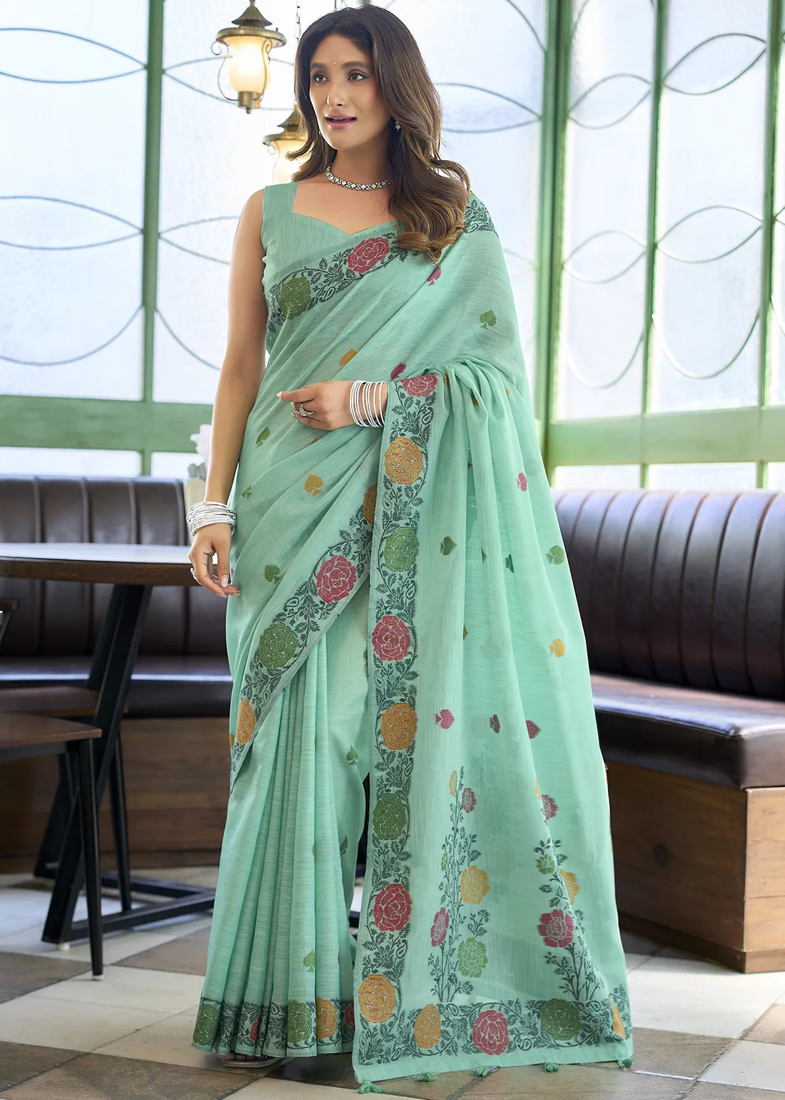 Sea Green Woven Linen Saree with Floral Motifs Sea Green Woven Linen Saree with Floral Motifs