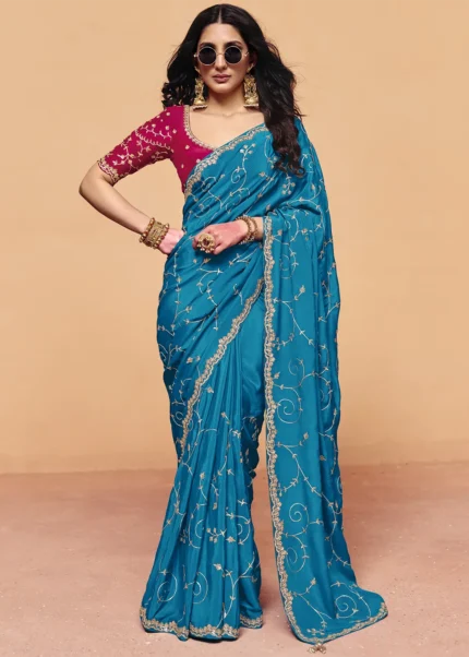 Teal Blue Embroidered Organza Saree with Rani Pink Blouse